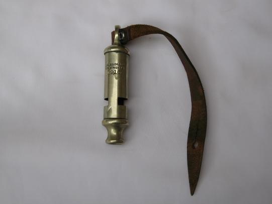 Wonderful WWI Hudson Trench Whistle with leather strap with Broad Arrow.