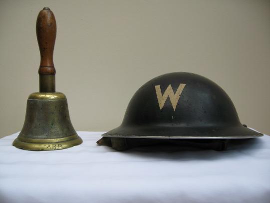 Totally wonderful original WWII Air Raid Brodie Helmet with original Air Raid Hand Bell