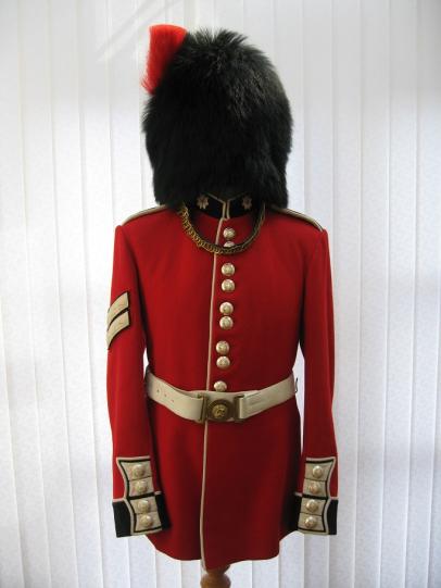 A British Corporal Cold Stream Guards Parade Tunic and Bear Skin . Queens Guard