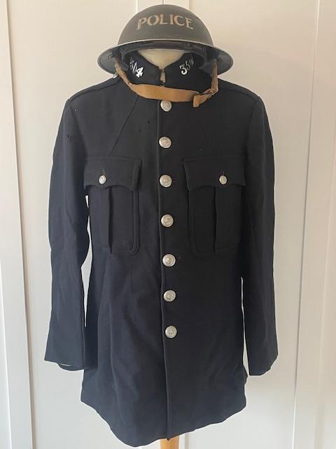 TOTALLY ORIGINAL BRITISH WWII, BOBBIES TWO POCKET TUNIC AND HELMET 1939.