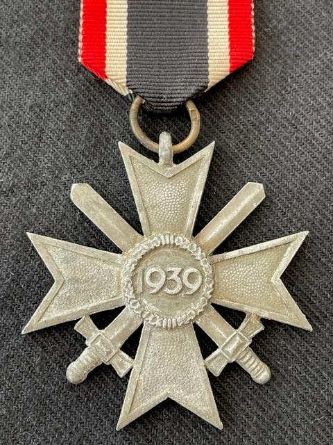 GERMAN WWII WAR MERIT CROSS 2nd CLASS WITH SWORDS NUMBERED RING 45 PRODUCED BY JULIUS BAUER SOHNE.
