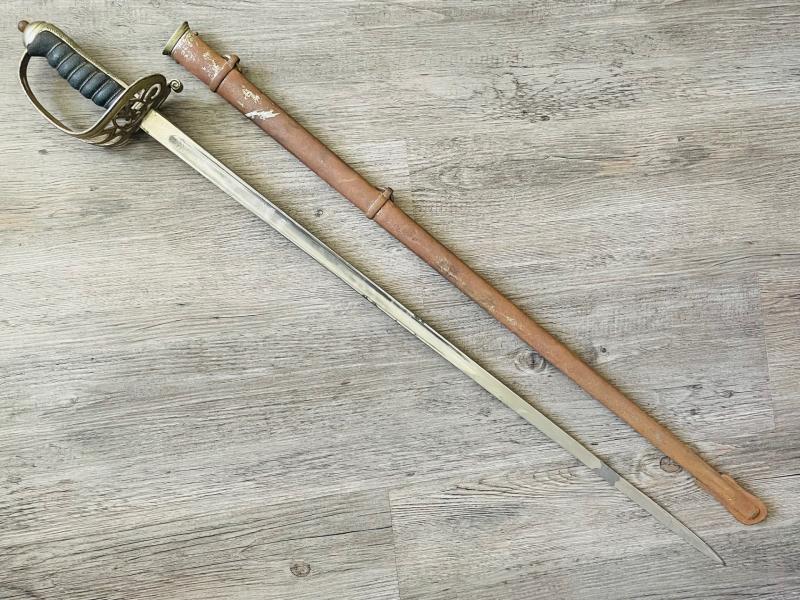 ORIGINAL NAMED ROYAL NAVY COMMANDERS DOUBLE SET OF UNIFORMS WITH OFFICERS SWORD. ADDITIONAL PHOTOS