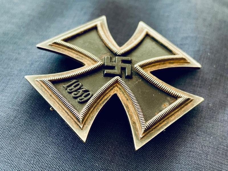 RARE CONCURVED WWII 1ST CLASS IRON CROSS STAMPED NUMBER 4, STEINHAUER & LUCK OF LUDENSCHHELD.